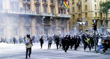 Genova, 20 anni fa. Neo-razzisti e neo-schiavi: dietro la repressione, il business
